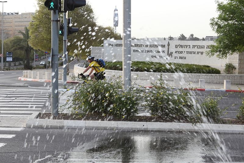 Burst water pipe with escaping water